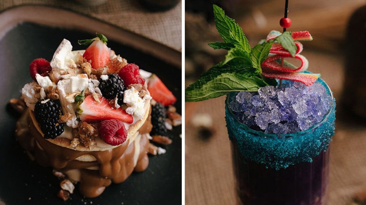 Pancakes del Amanecer piled with fresh fruit. Right: Mojiposa cocktail with rum, blueberry liquor, maple syrup, and butterfly pea flower soda.