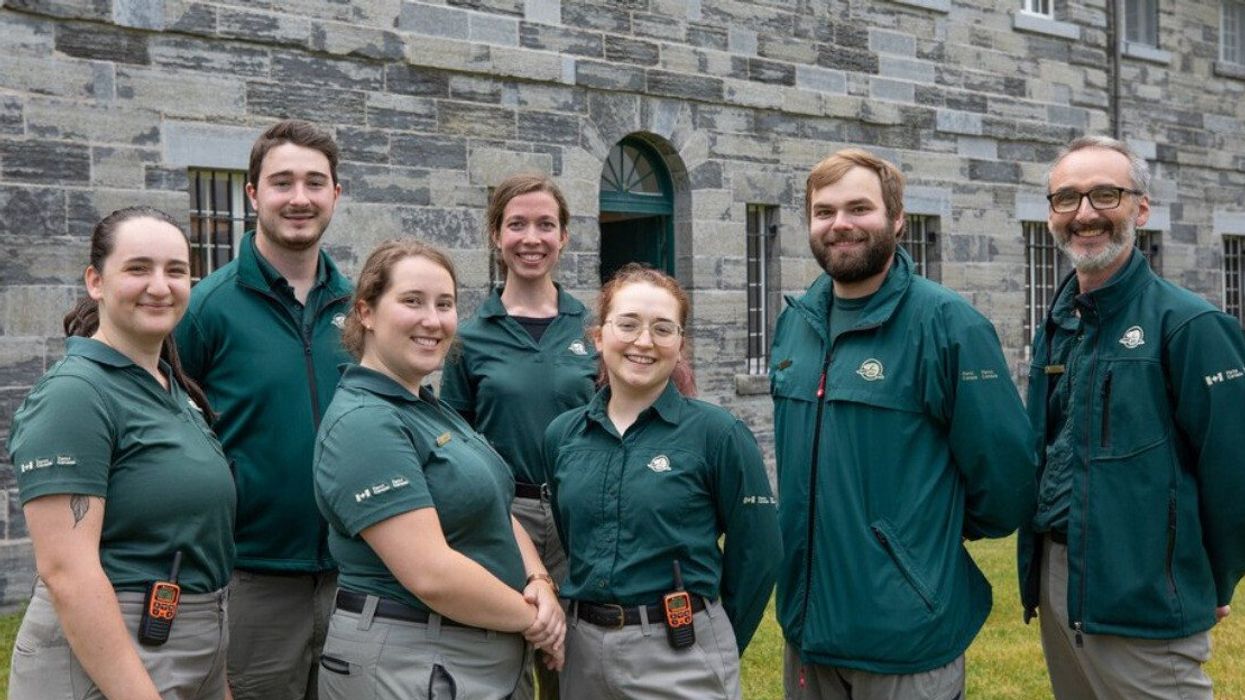 Parks Canada employees pose for a group shot.