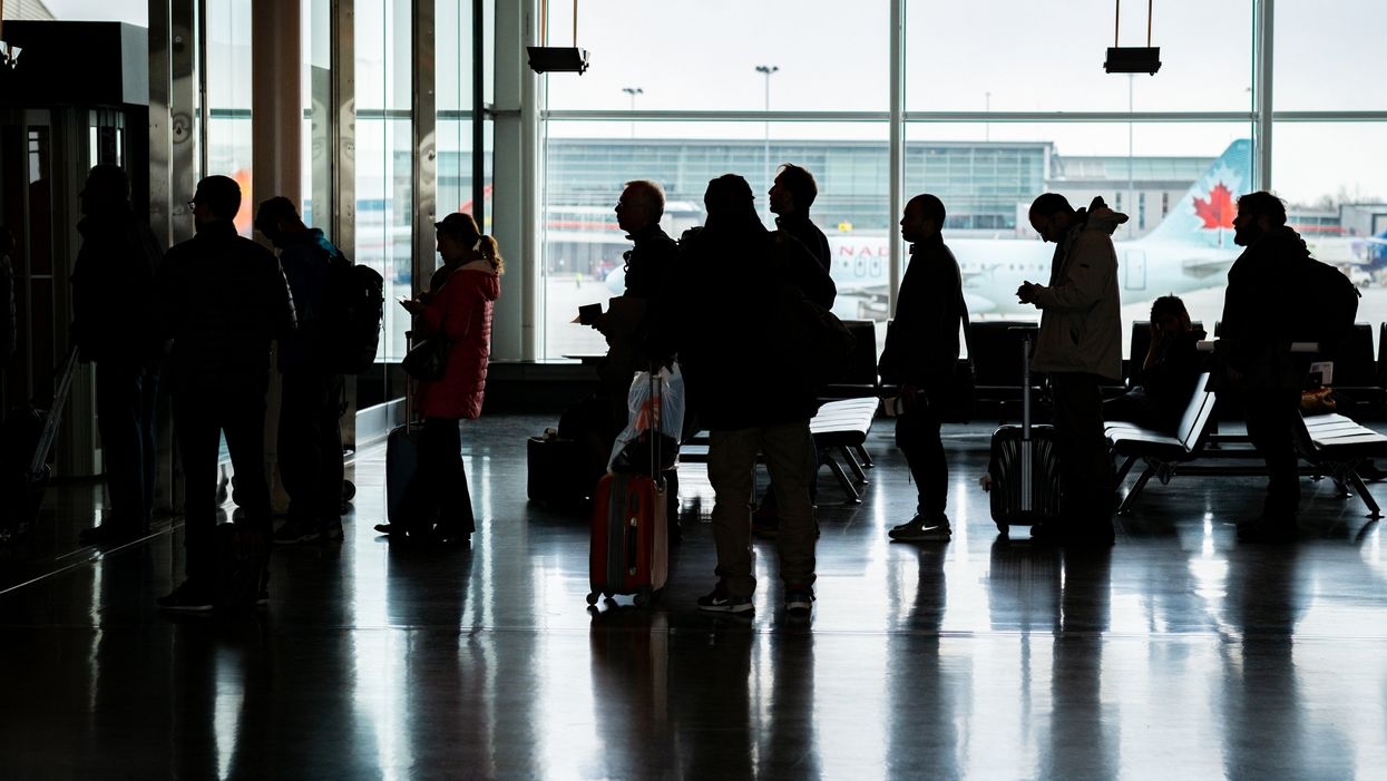 Passengers in line at Montreal's Trudeau International Airport.