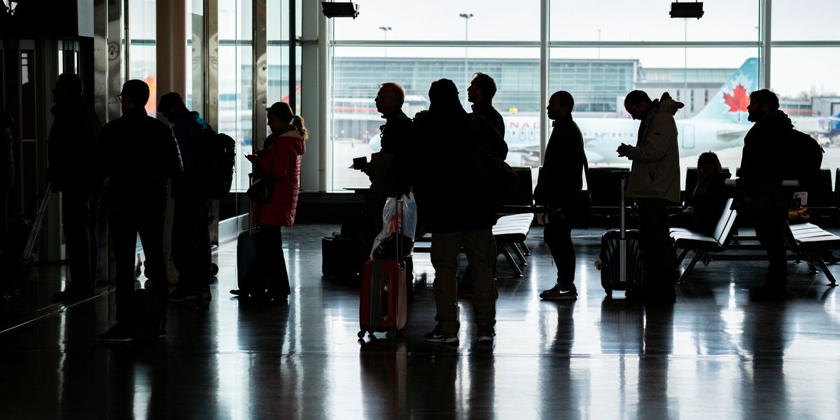 2 men were arrested at Montreal airport after a mysterious incident caused flight delays 2 men were arrested at Montreal airport after a mysterious incident caused flight delays