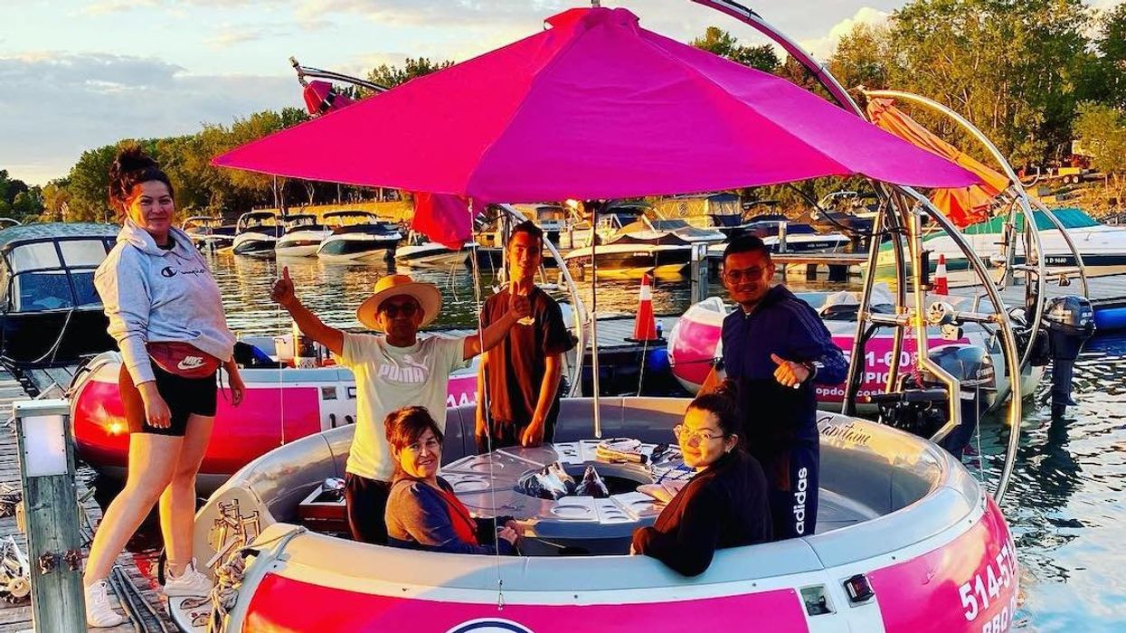 People board a Top Dopico's BBQ donut.