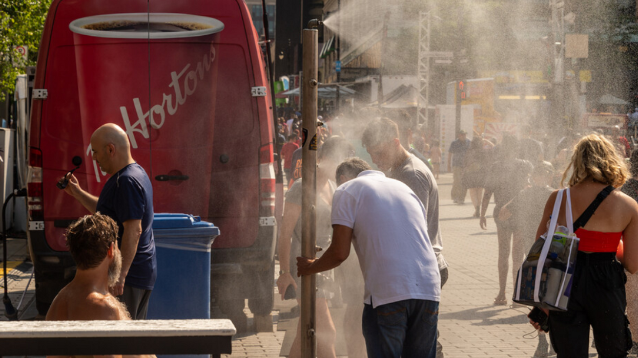 People cool off during a Montreal heatwave.