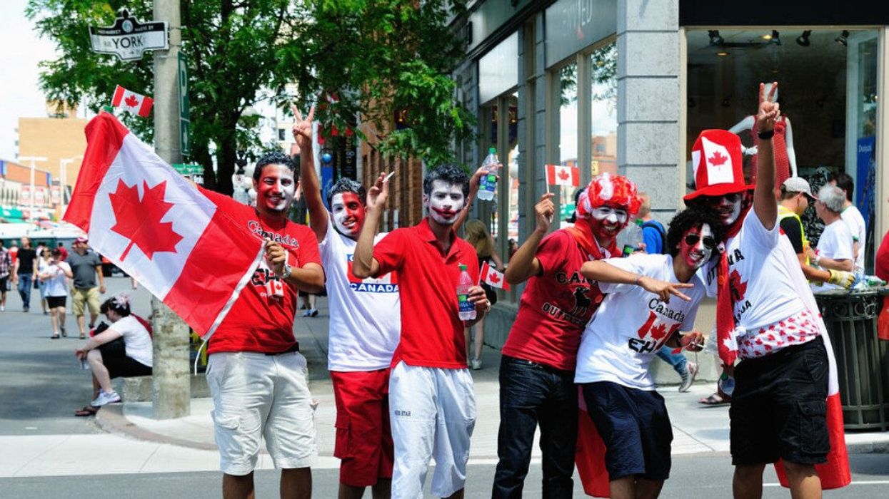 People decked out in Canadian flags.
