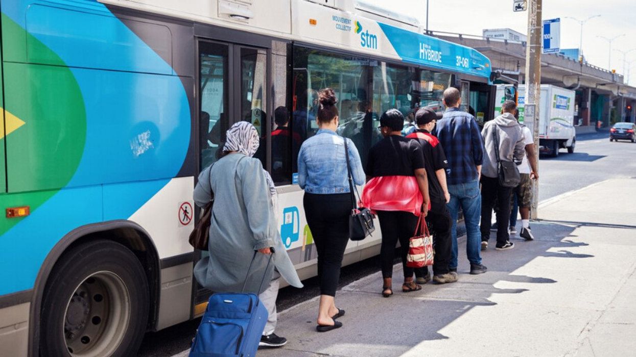 People lining up for a bus in Montreal.