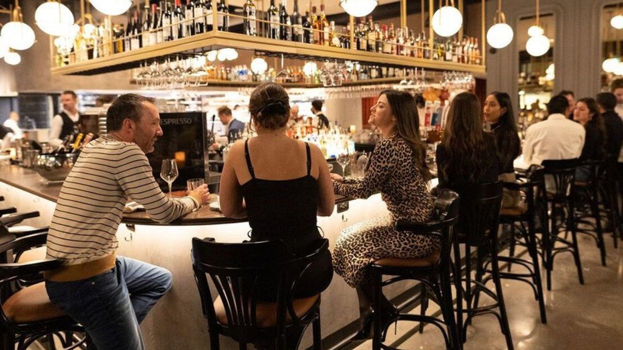 People sit at the bar in Montreal's Le Molière par Mousso.