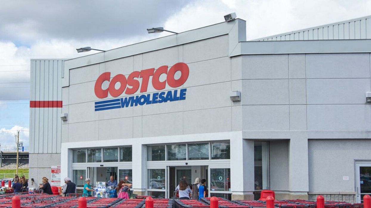 People walk into a Montreal Costco Wholesale.