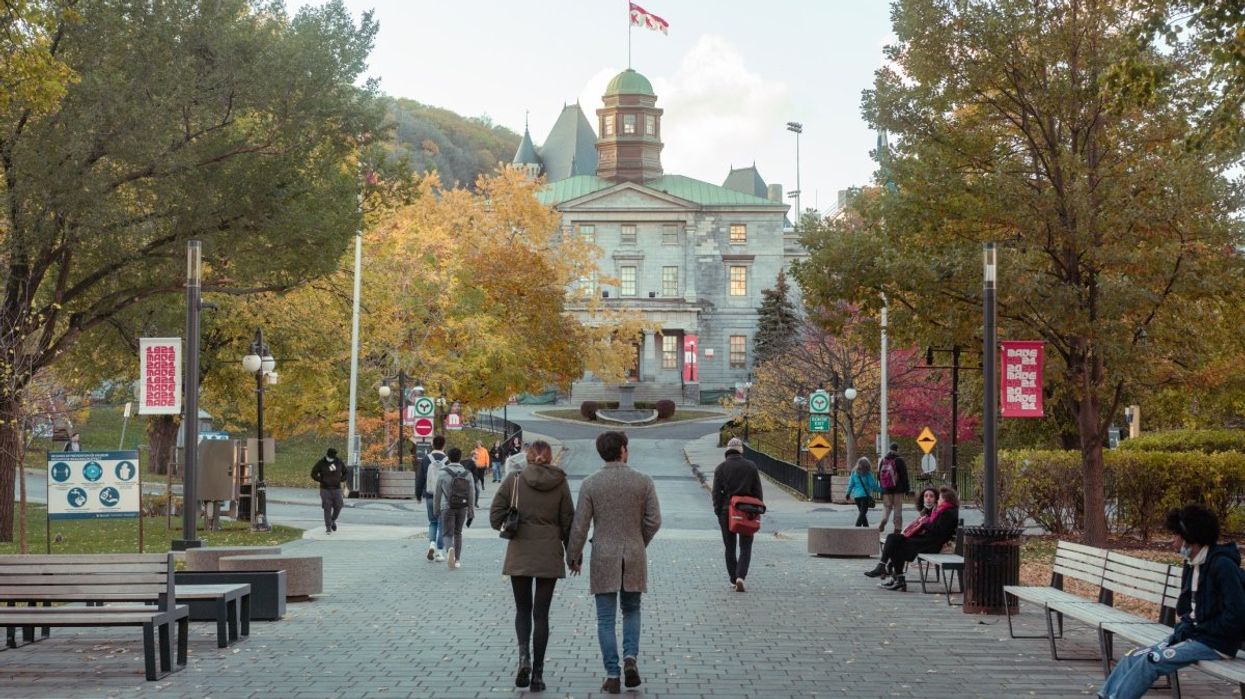 People walking toward McGill University campus in Montreal, Quebec during the fall.
