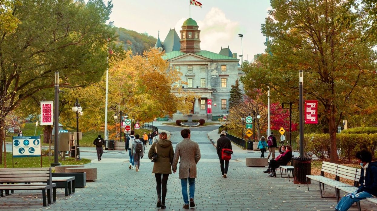 People walking toward the McGill University campus during the fall time.