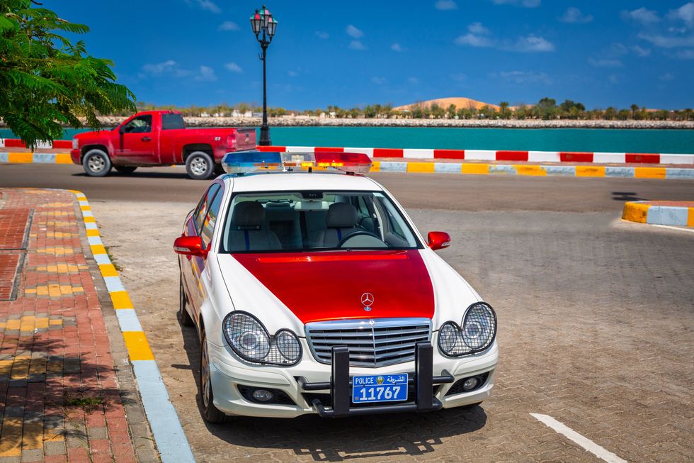 Police Mercedes on the street of Abu Dhabi.