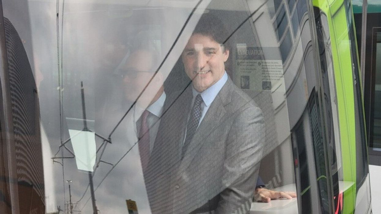 Prime Minister Justin Trudeau at the front of the inaugural Montreal REM train.