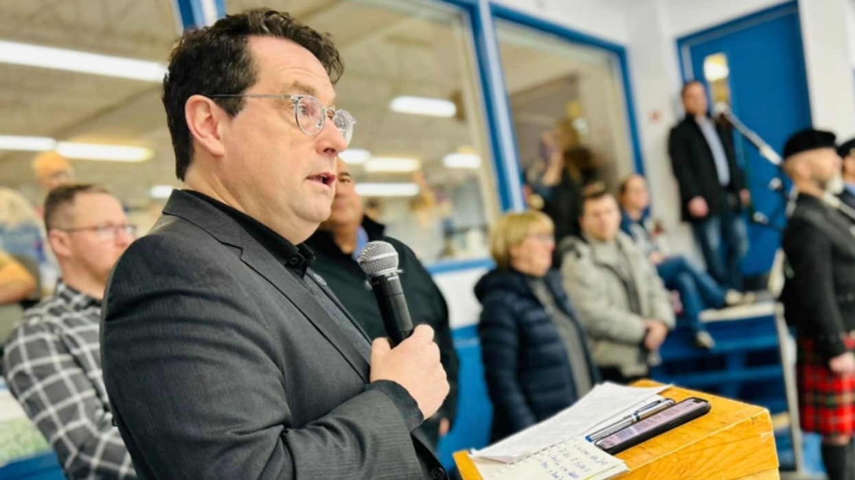 Quebec Education Minister Bernard Drainville speaks to a crowd in Lévis.