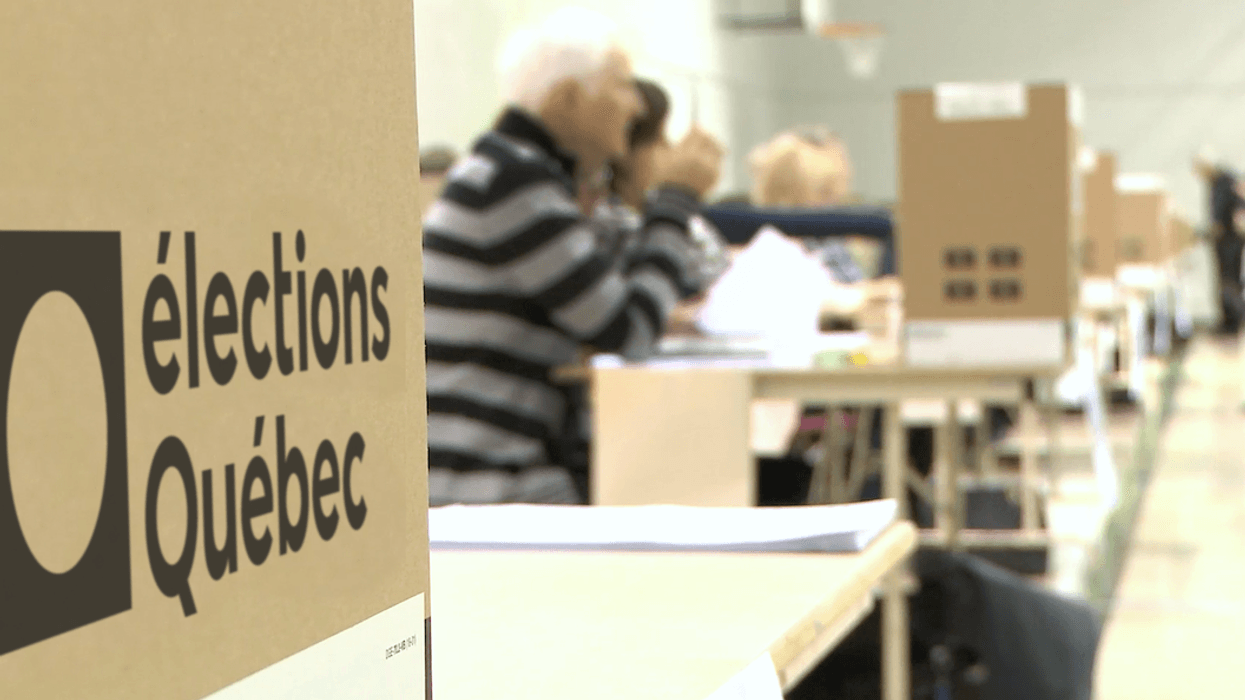 Quebec polling station with the Élections Québec logo visible.