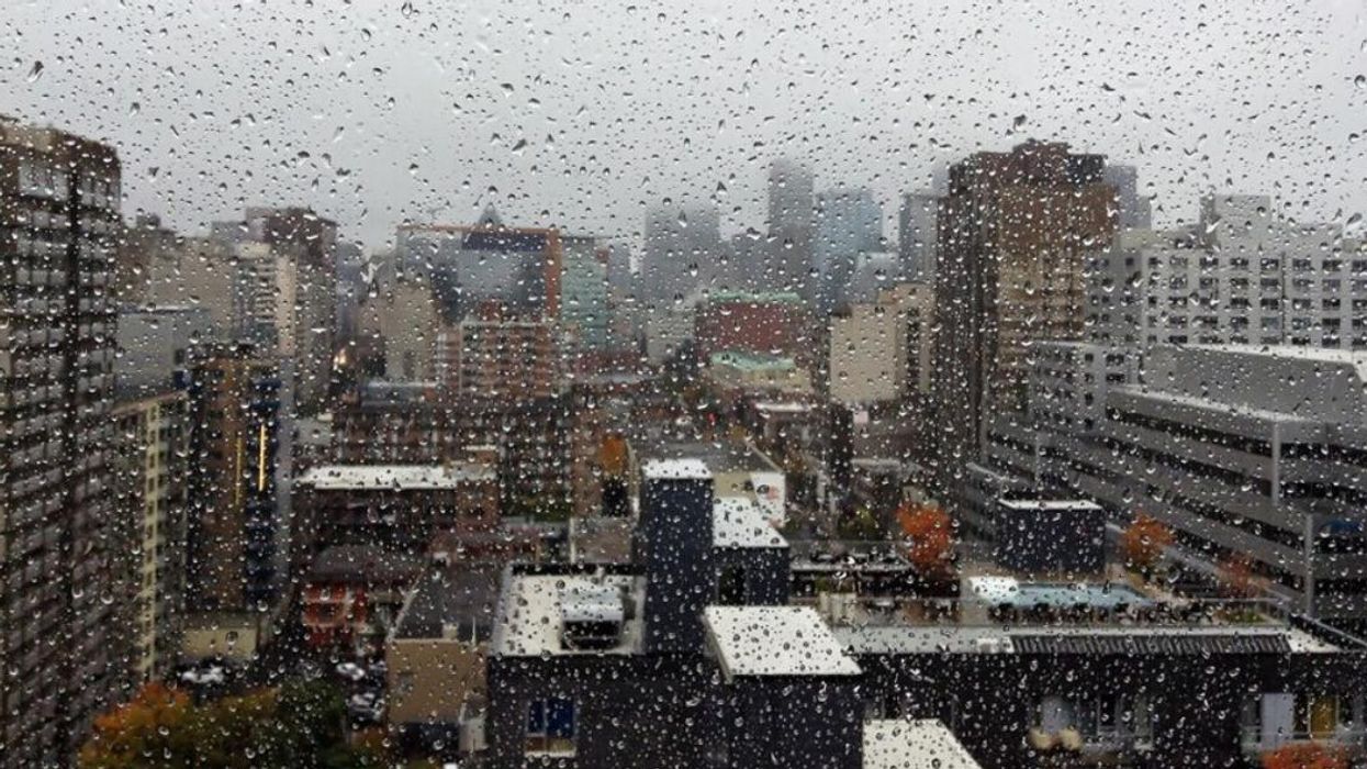 Rain on a window overlooking downtown Montreal.