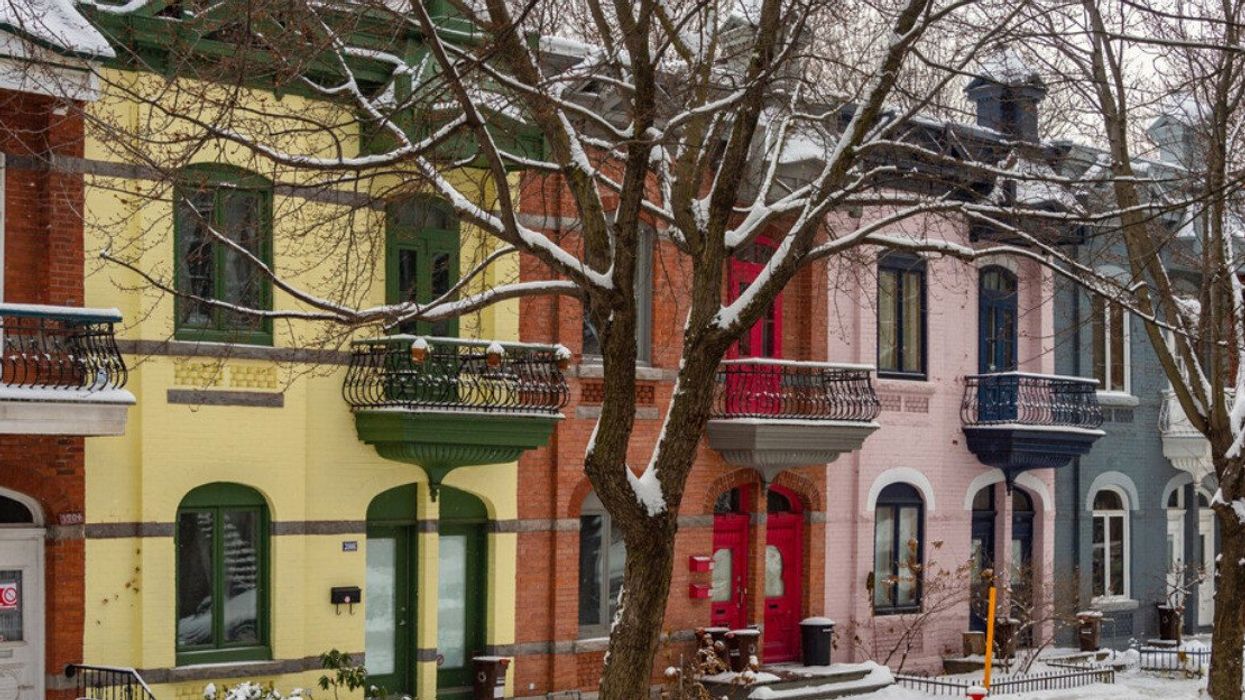 Row houses with colorful facades in the Plateau neighborhood in winter.