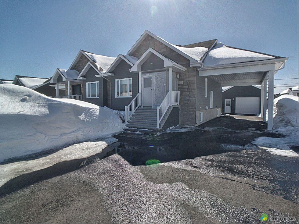 Semi-detached home for sale in Saguenay, Quebec.