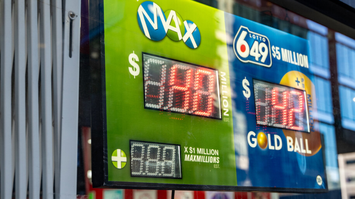 Sign advertising Canadian lottery games.