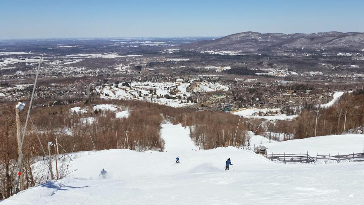 Skiers descend a snow-covered slope at the Bromont ski resort in 2015.