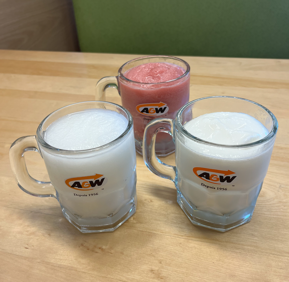 Small glasses of all three A&W frozen lemonades sit on a table.