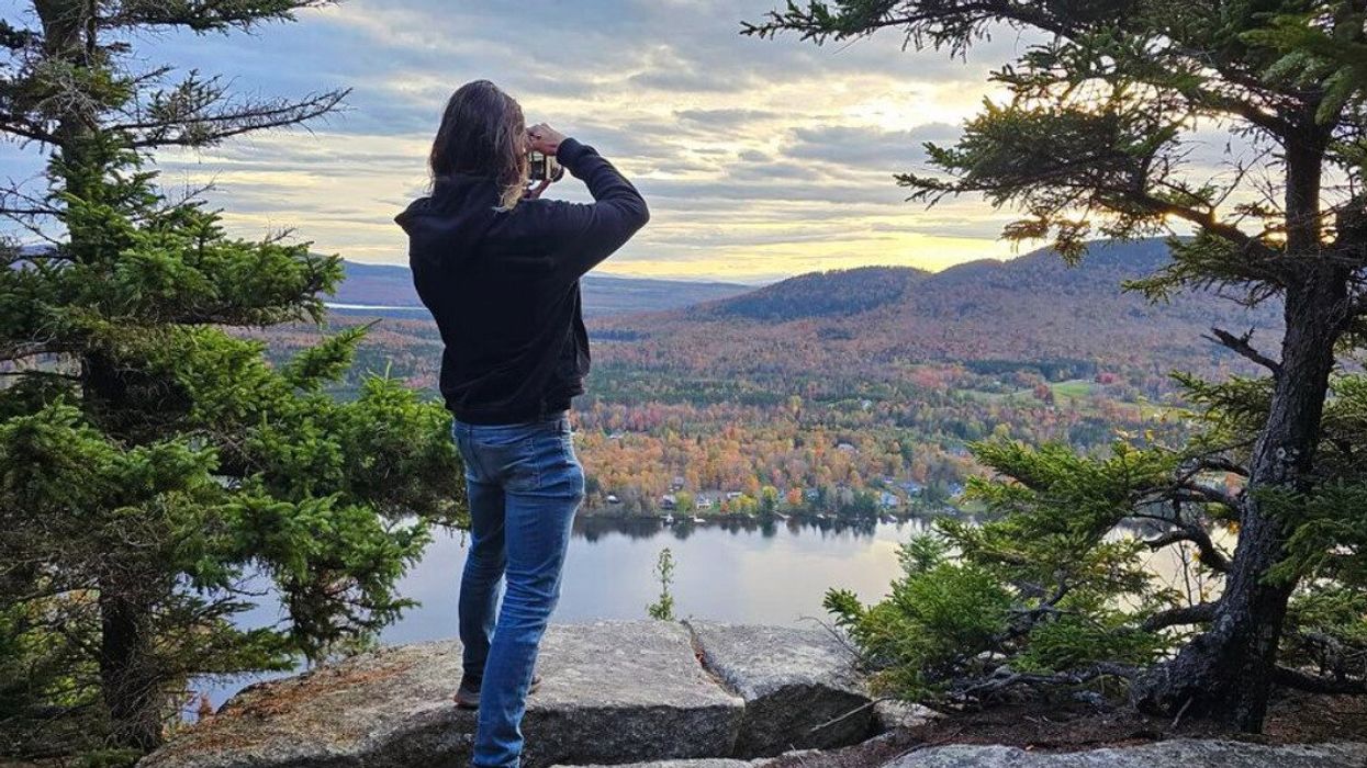 Someone takes a photo from Mount Pinnacle in Coaticook.