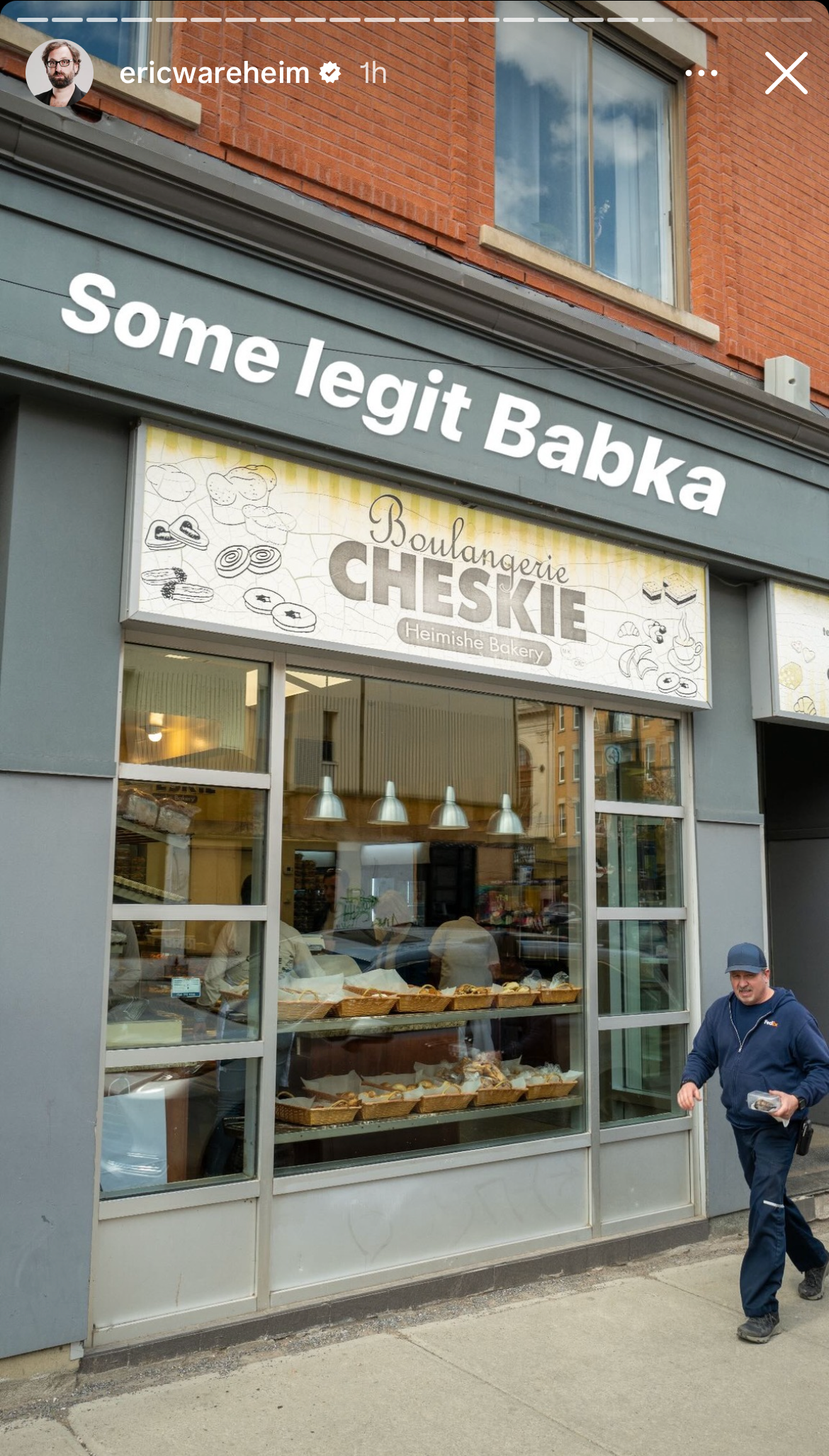 Someone walks in front of the \u200bBoulangerie Cheskie storefront, a famous Jewish bakery also known as Cheskie's, in Montreal.