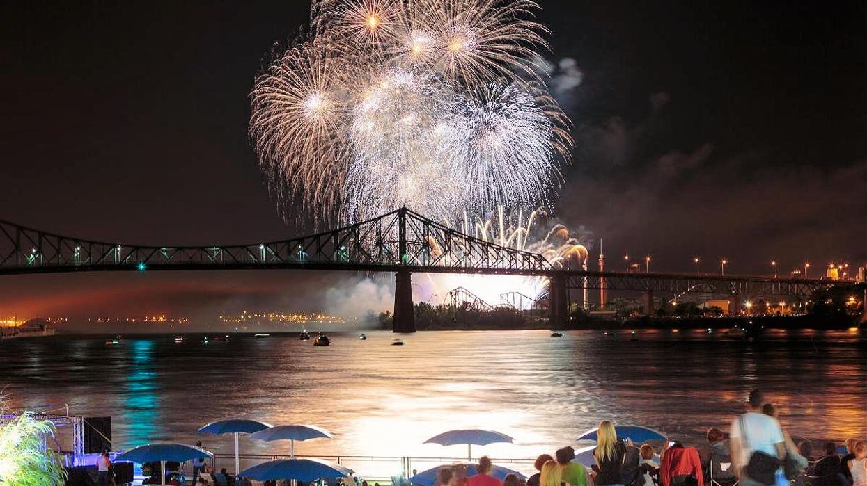Spectators watch the fireworks from Clock Tower Beach.