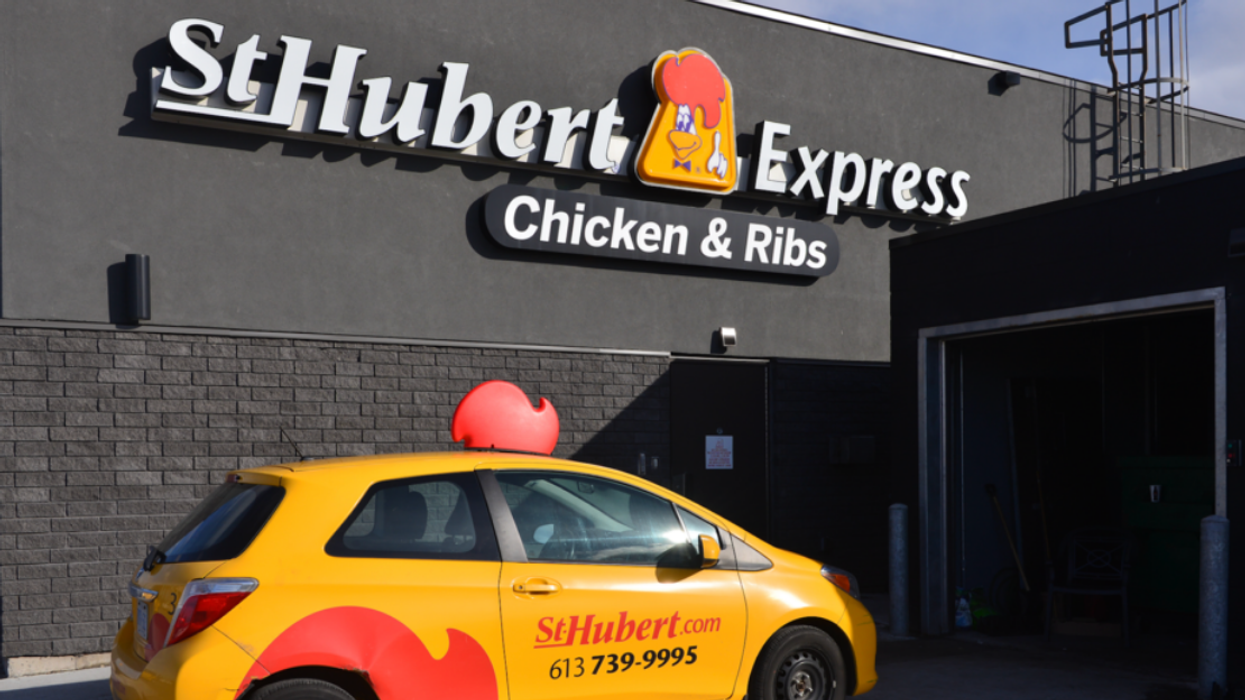 St Hubert store and delivery car in Ottawa, Ontario.