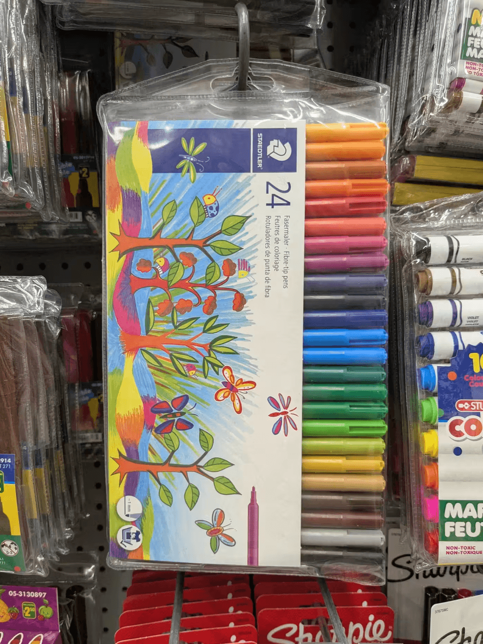Staedtler 24-pack fibre-tip markers hanging on a shelf at Dollarama.