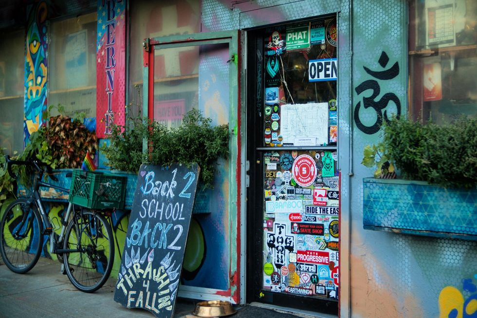 Sticker-covered entrance to Ridin' High in Burlington.
