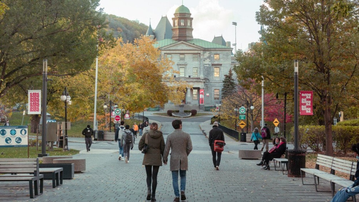 Students walk into McGill University.
