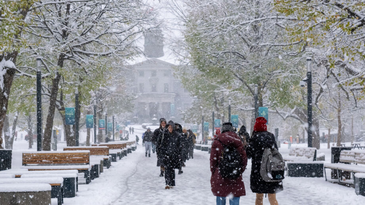 Students walk through the snow on McGill's downtown campus.