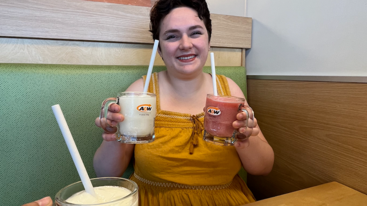 The author holding two of the three new A&W frozen lemonades.
