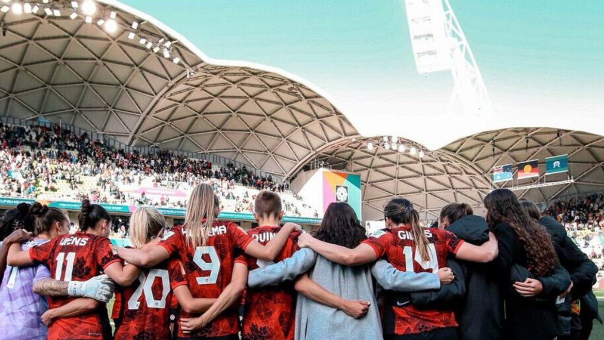 The Canada women's national soccer team huddles in a FIFA stadium in Australia.