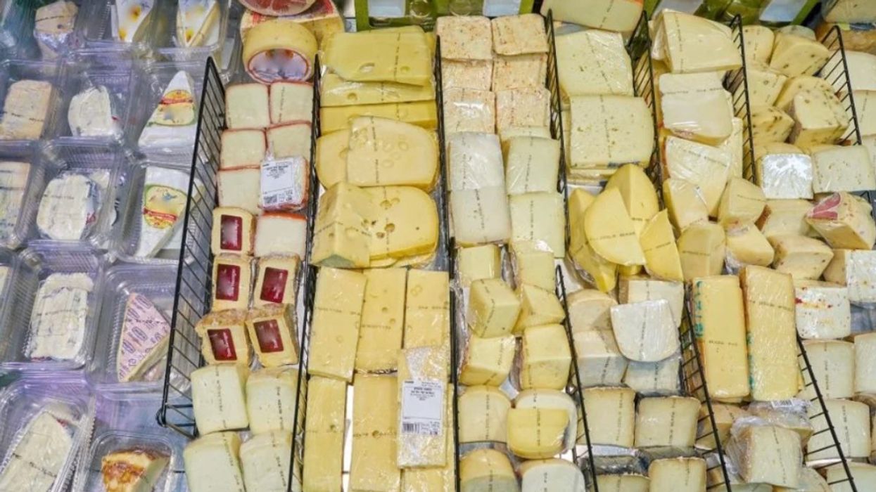 The cheese section of a supermarket.