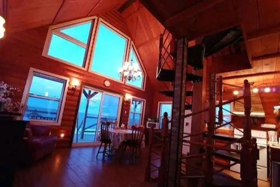 The combined living, dining and kitchen area of 749, boulevard du Griffon, Gasp\u00e9, QC.