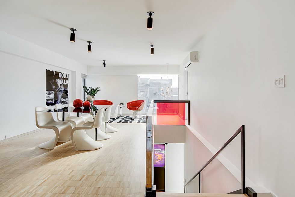 The dining area and staircase to the lower level.