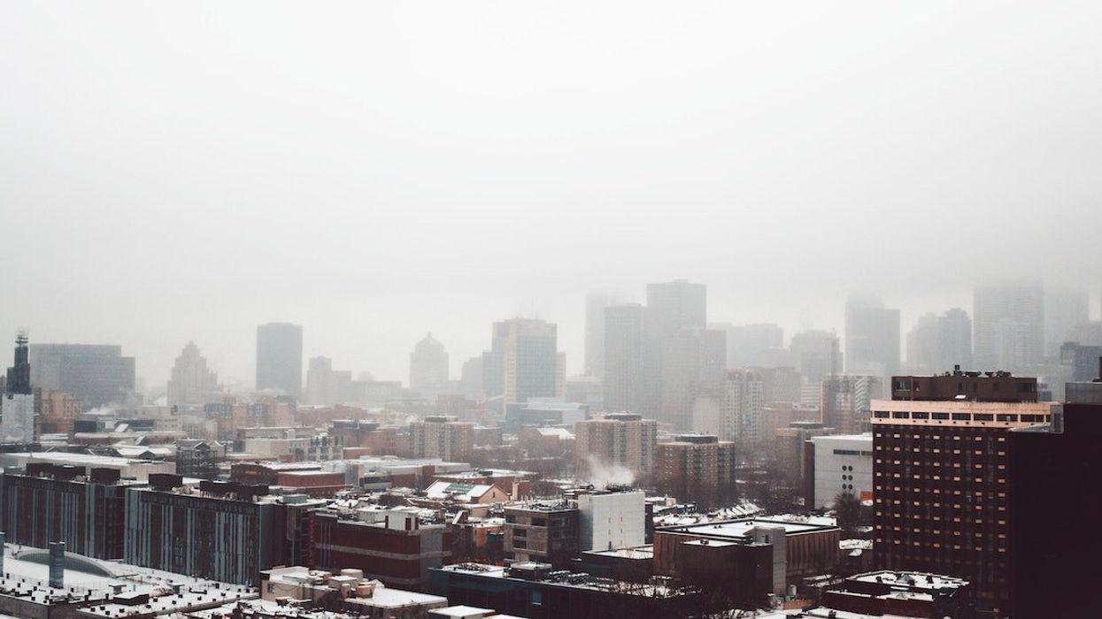 The downtown Montreal skyline on a foggy winter day.