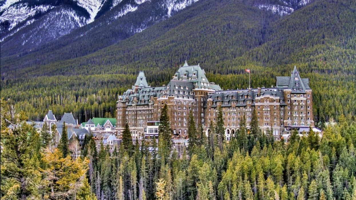 The Fairmont Banff Springs hotel in Banff, Alberta nestled between the Canadian Rockies.