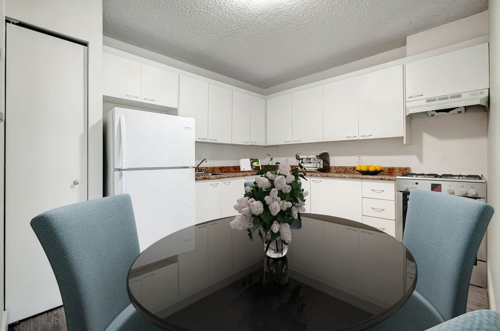 The interior of a kitchen in a Montreal studio apartment.