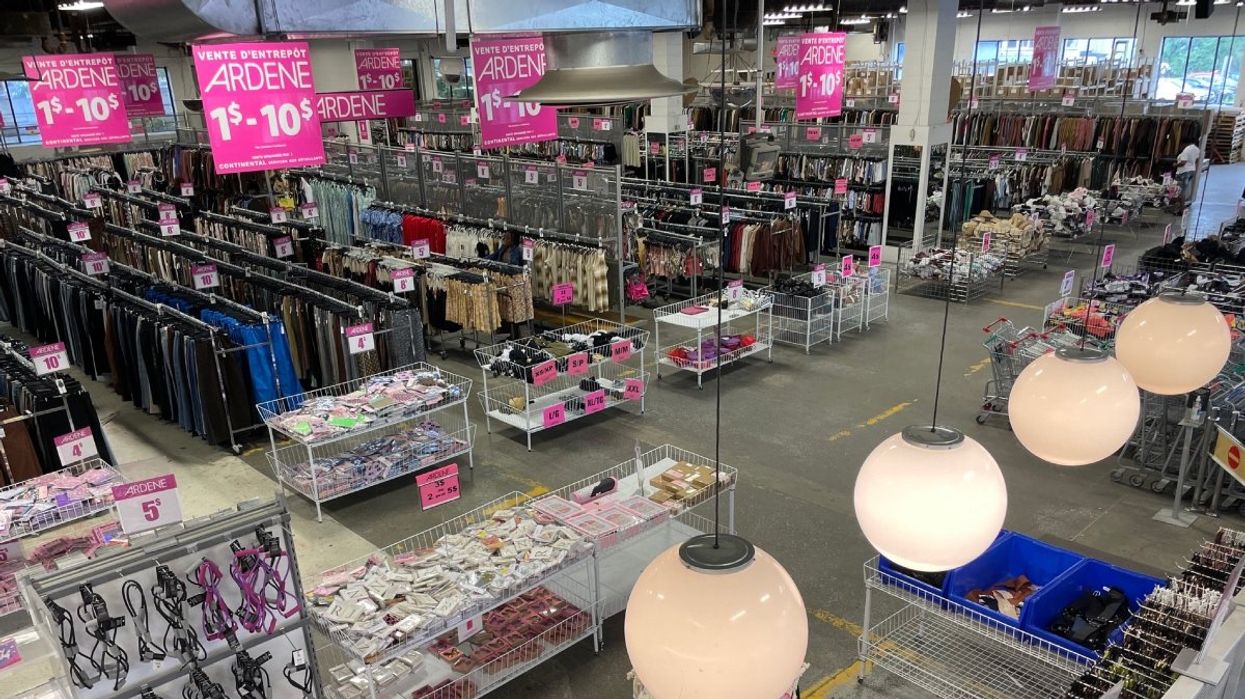The interior of Ardene's warehouse sale in Montreal featuring racks of clothes and accessories.