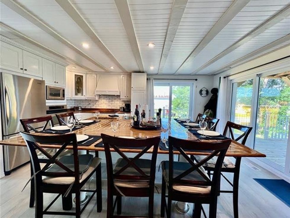 The kitchen and dining area of 91, route Langlois.