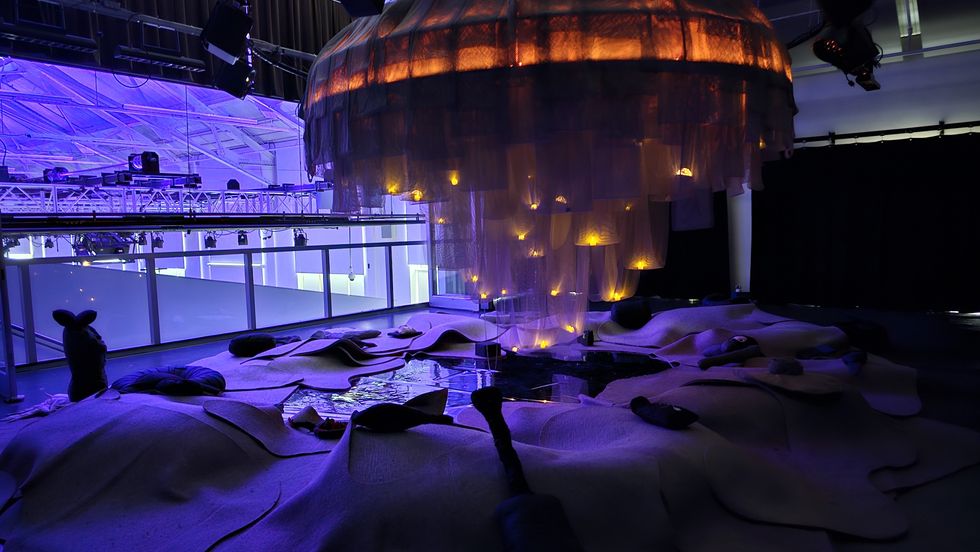 "The Lantern" is a mushroom-shaped chandelier in an intimate part of the exhibit where visitors can sleep.