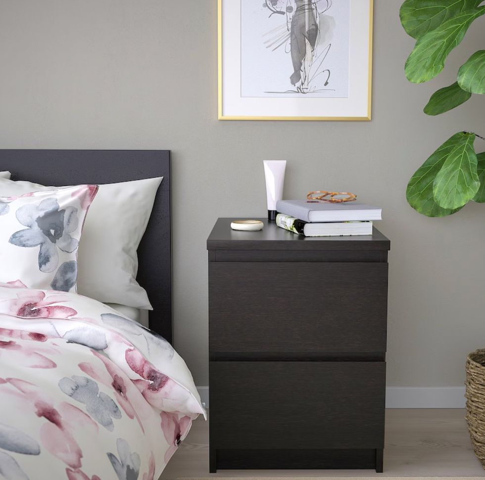 The MALM 2-drawer chest at a bedside.