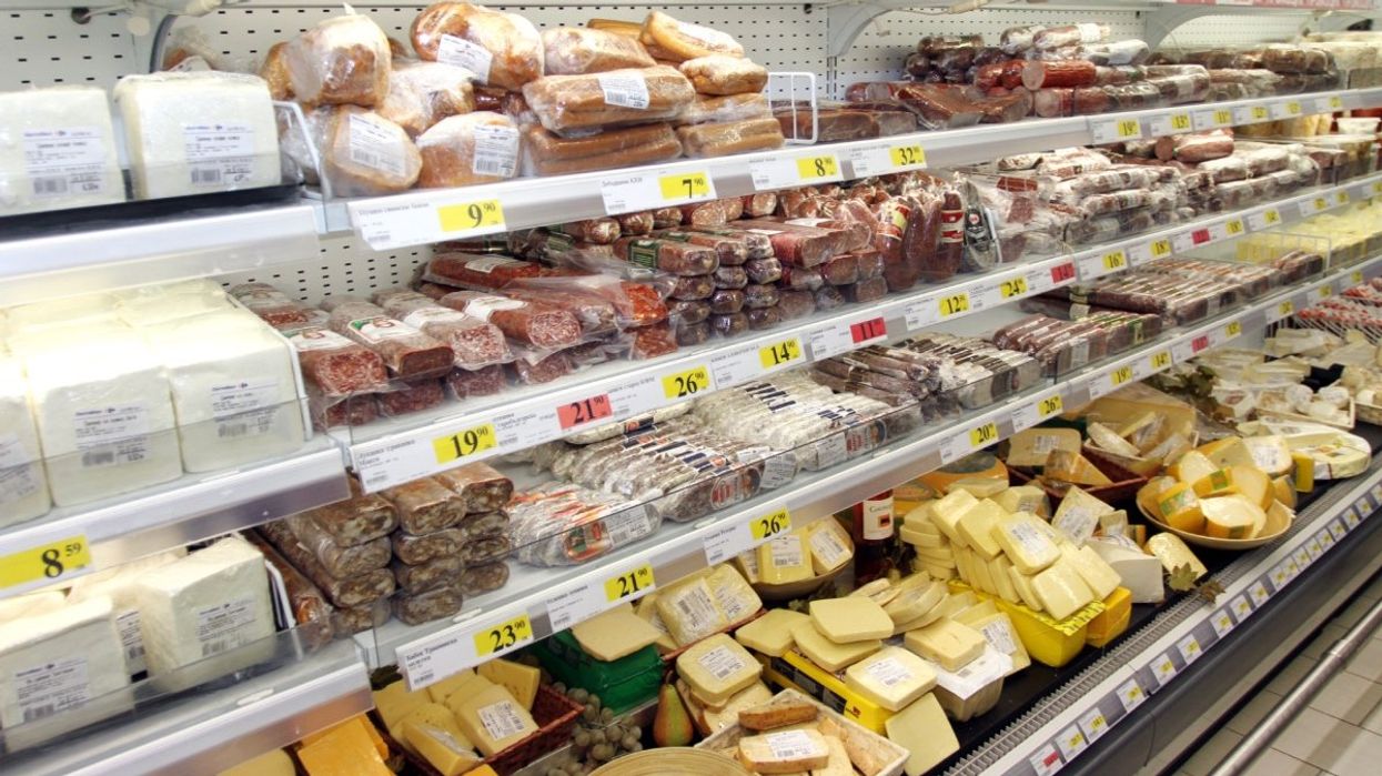 The meat and dairy section at a grocery store.