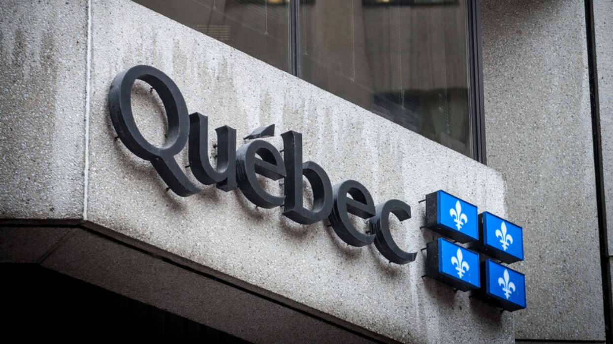 The Quebec government logo as displayed on an administrative building.