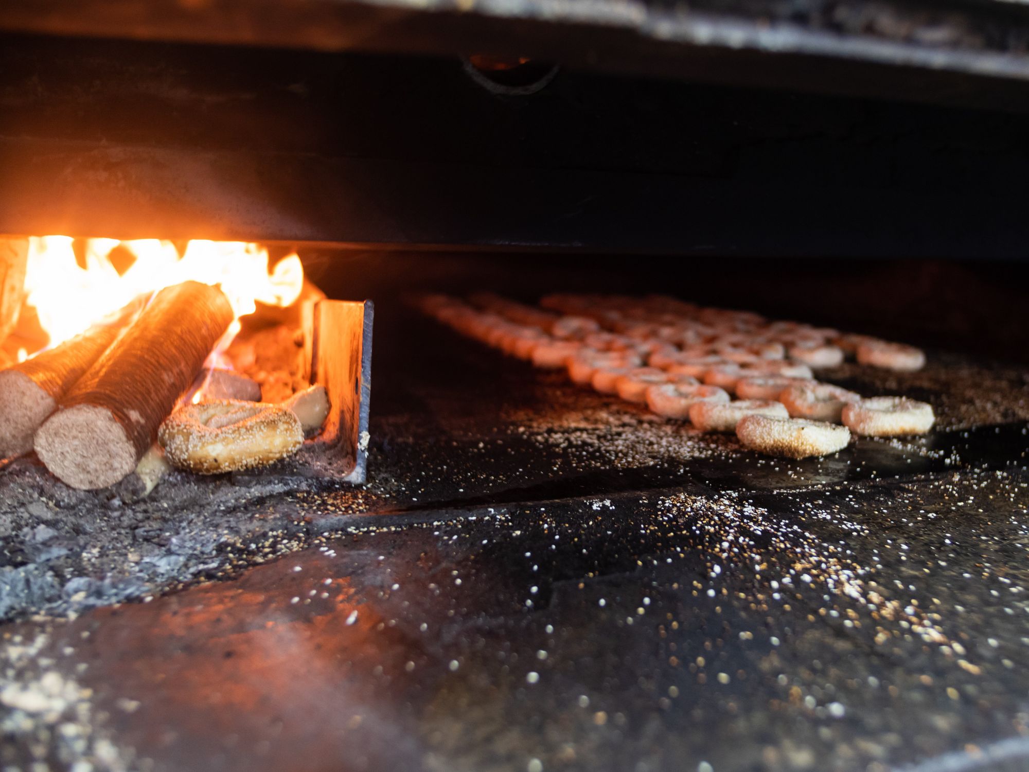 The St-Viateur wood-fire oven bakes four dozen bagels every rotation.