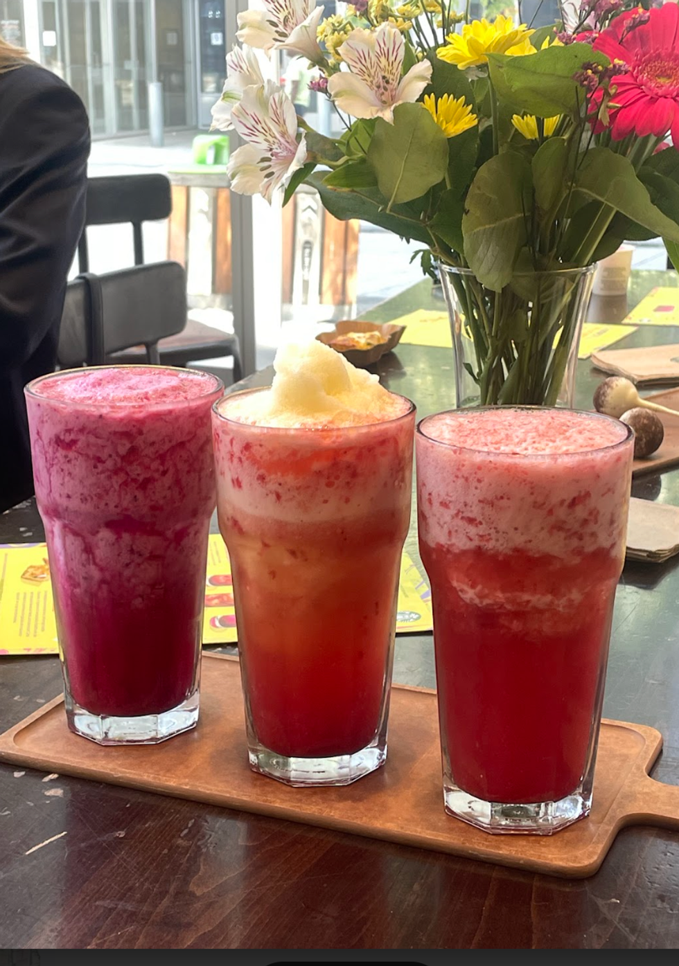 The three new frozen Refreshers sit on a display cutting board in all their glory.