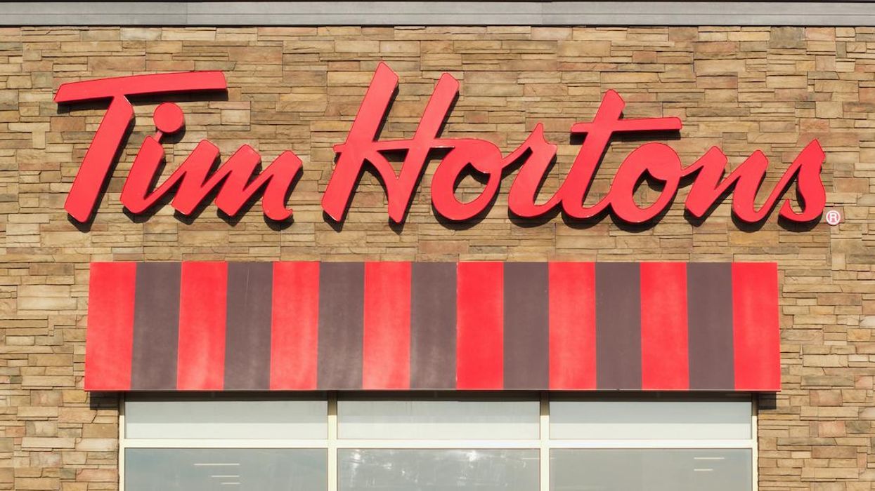 The Tim Hortons logo on a restaurant façade.