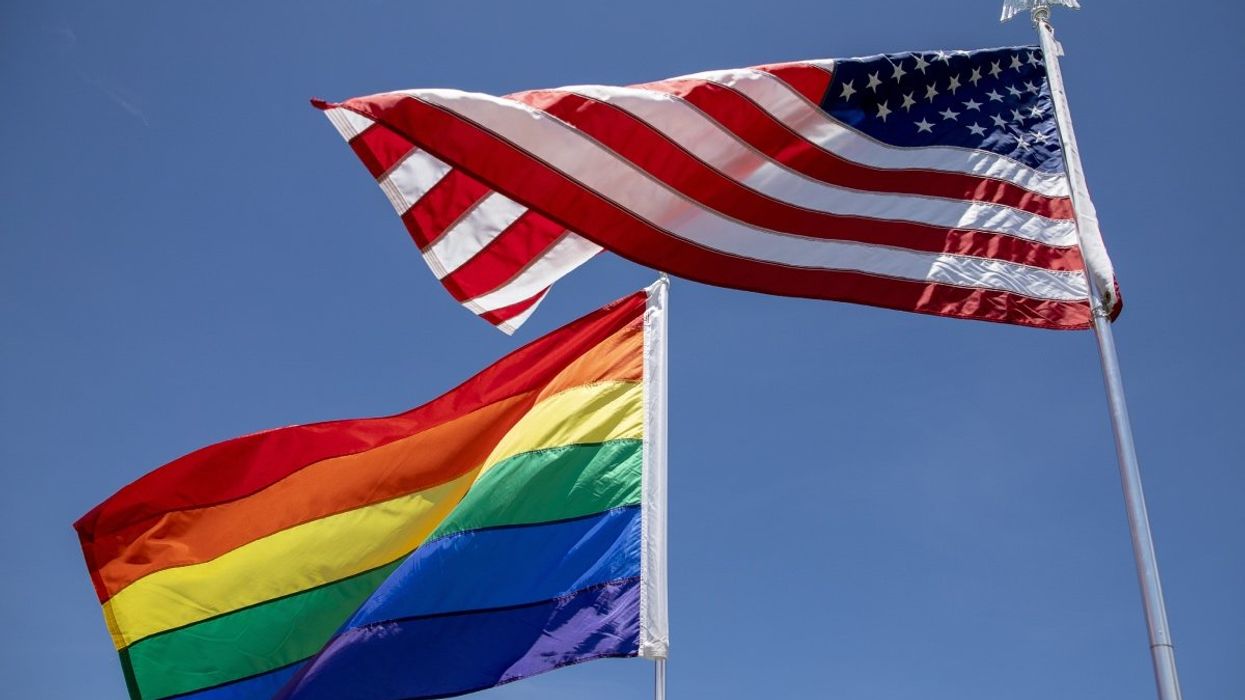 The U.S. flag and the price flag flying simultaneously.