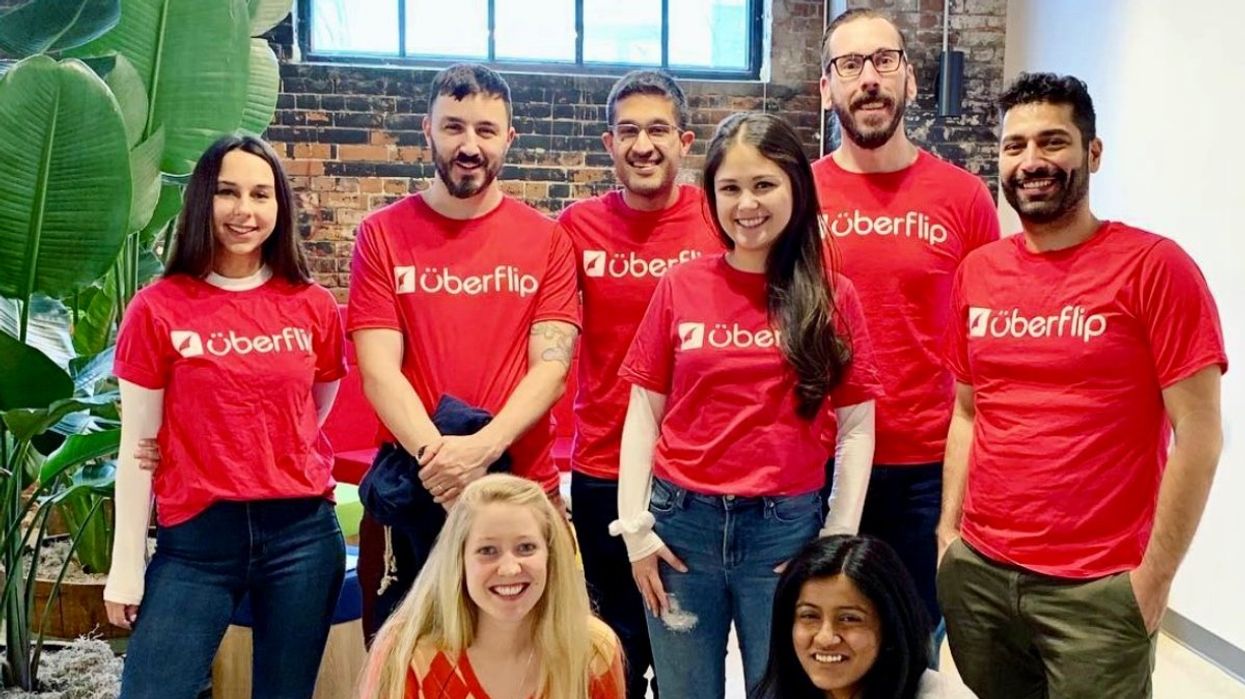 The UberFlip team taking a photo together at their headquarters in Canada.