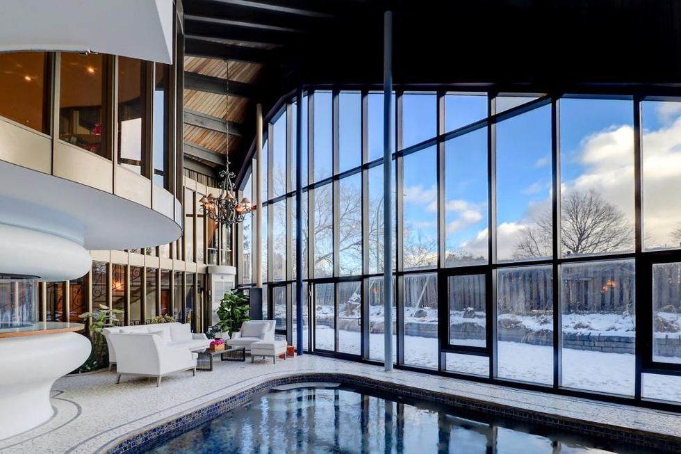The view of the backyard from the indoor pool.